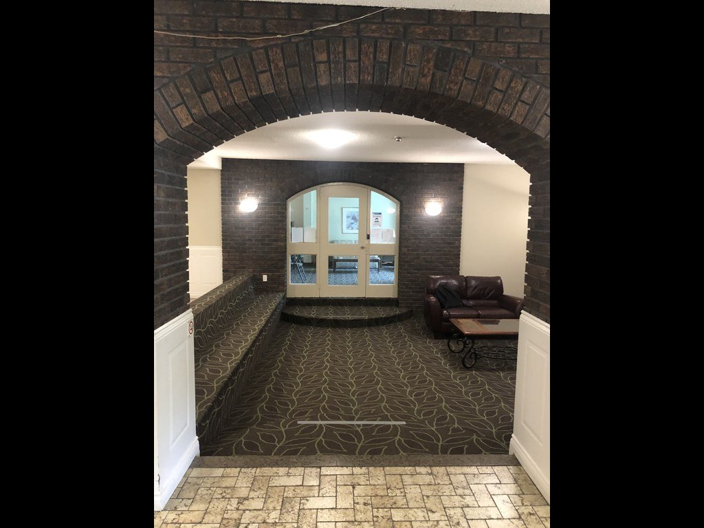 966 Inverhouse Drive condo lobby before refurbishment - Folio Interiors